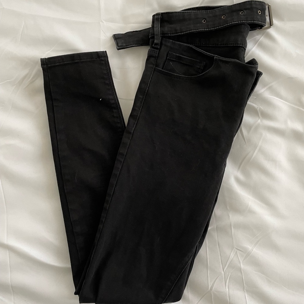 Black skinny jeans with belt attached